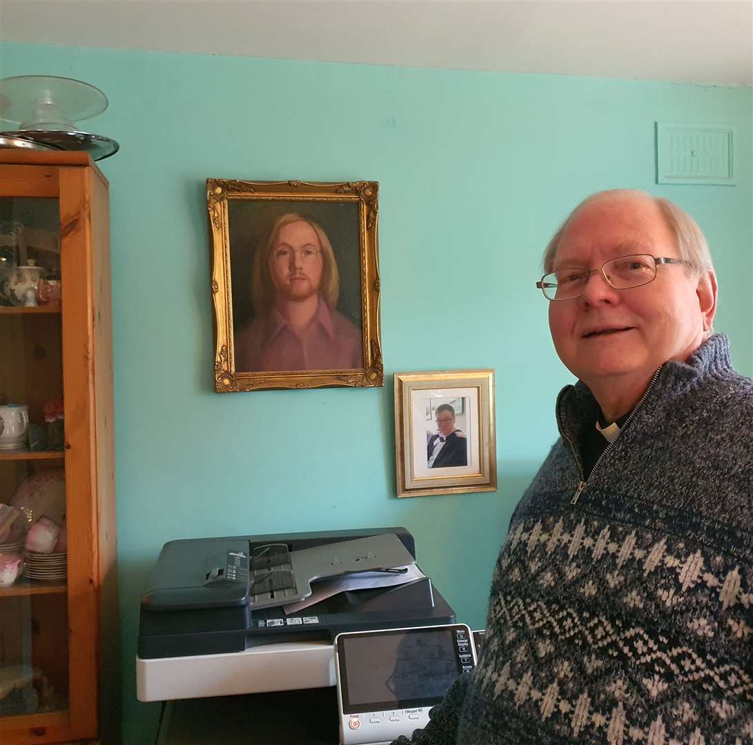 Father Jonathan with a portrait of himself