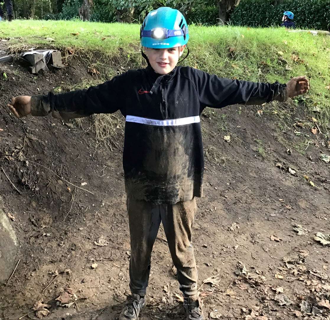 The pupils donned hard hats for the caving.