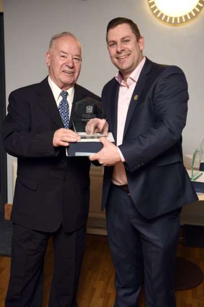 Wisbech's unsung heroes awards night at The Oasis Centre - Rex Venni collects his award from Councillor Andrew Lynn.