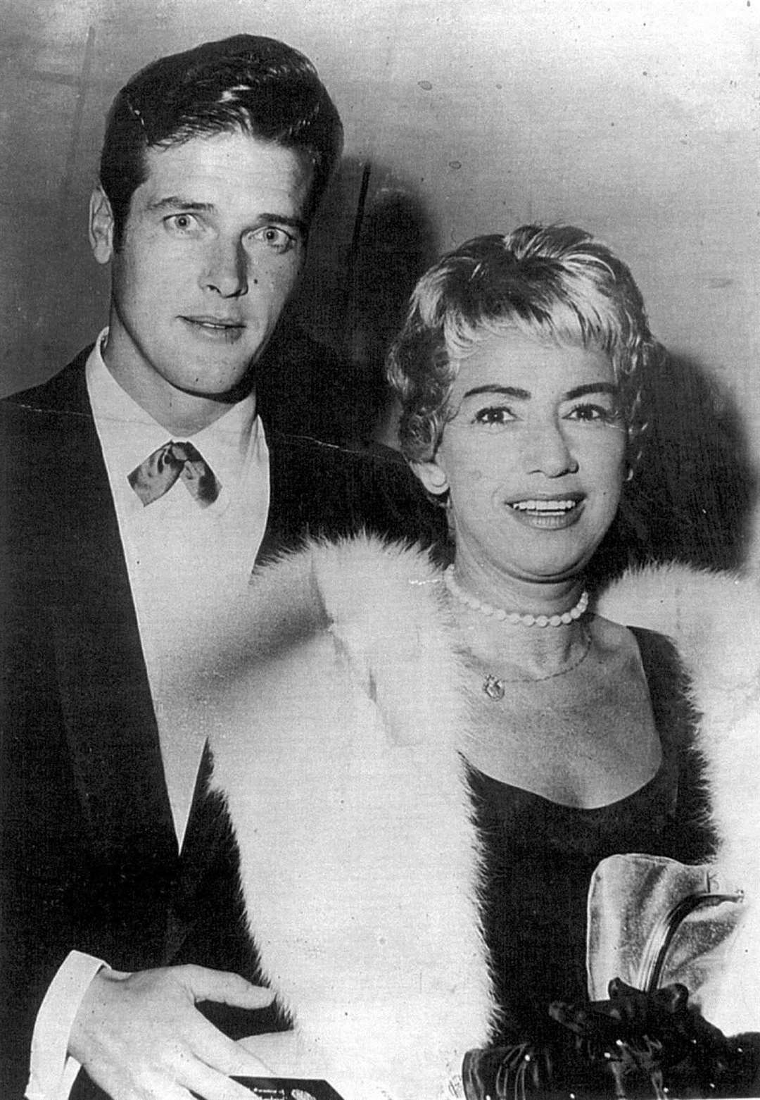 Singer Dorothy Squires with actor Roger Moore soon after their marriage in 1953 (PA)