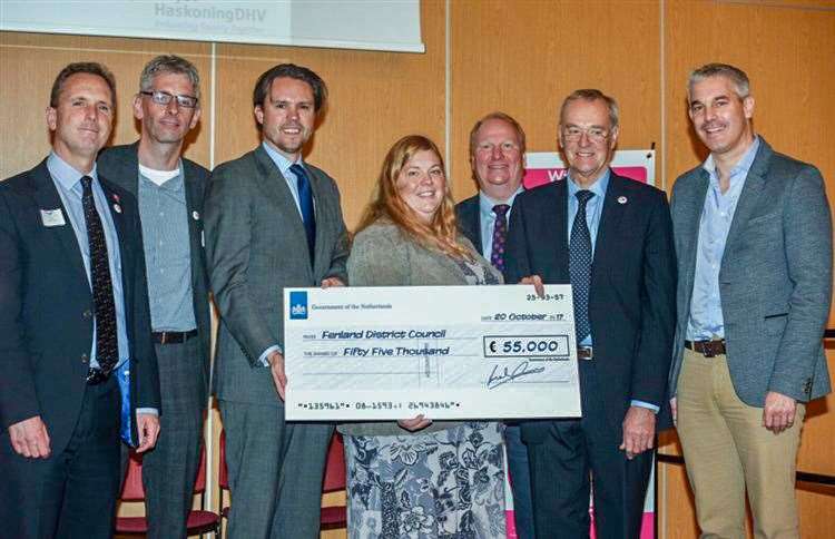 Flashback to the fifth Wisbech 2020 summit in October 2017 when the flooding work was announced. Matthijs Hou�t, Senior Commercial Attach� at the Dutch embassy in London presents the cheque at the fifth Wisbech 2020 summit. Pictured from left: Peter Simpson, Anglian Water; Japp Flikweert, HaskoningDHV; Matthijs Hou�t; Sam Hoy, leader of Wisbech Town Council; Steve Count, leader of Cambs County Council; John Clark, leader of Fenland Council; Steve Barclay, MP. (28922102)