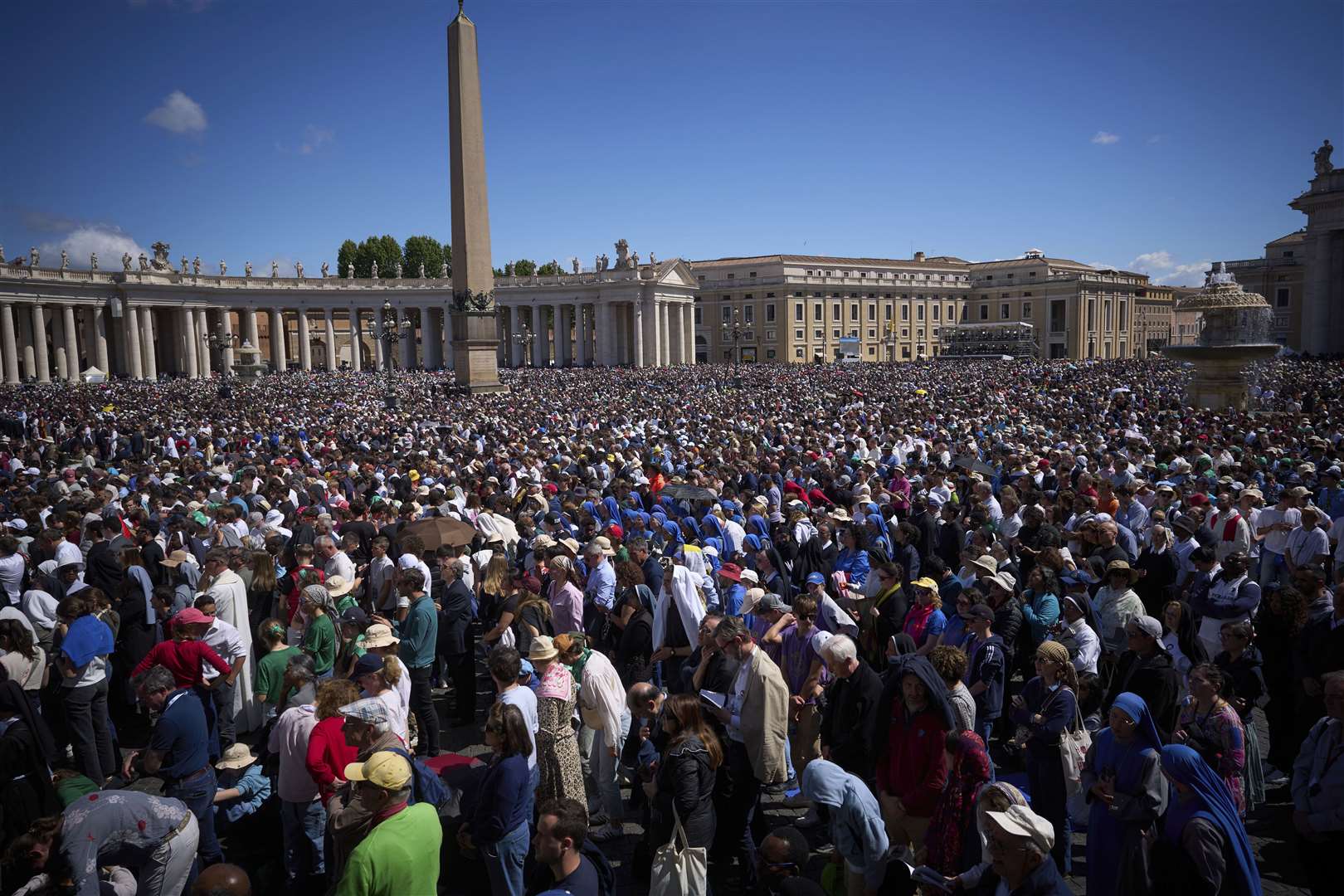 Crowds listen to mass during the funeral of Pope Francis in St Peter’s Square (Emilio Morenatti/AP)