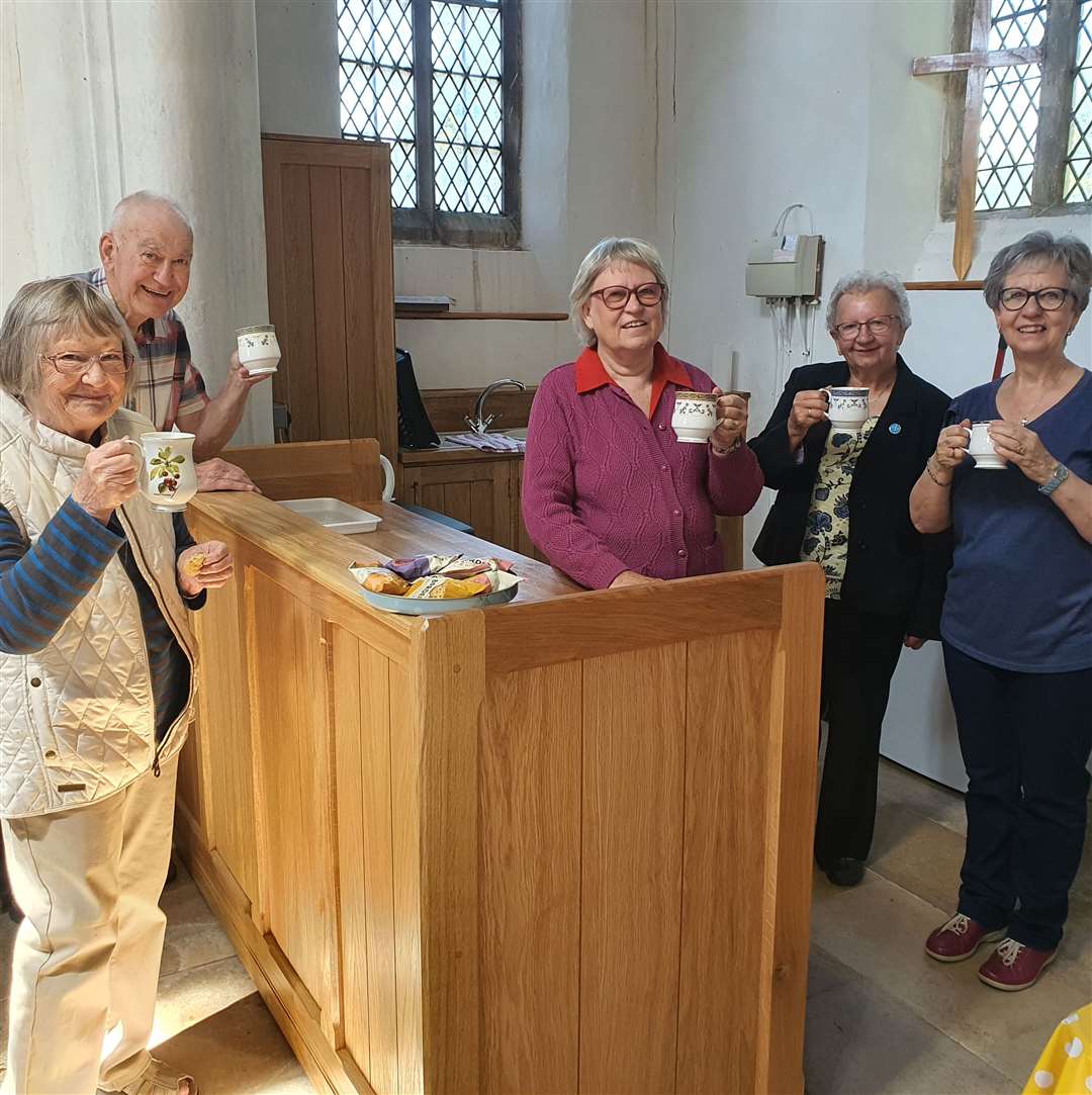 Joyce Mayne, Eric Saxton, Cathie Whenman, Pat Saxton and Mandy Tolliday give a three cheers to the new servery