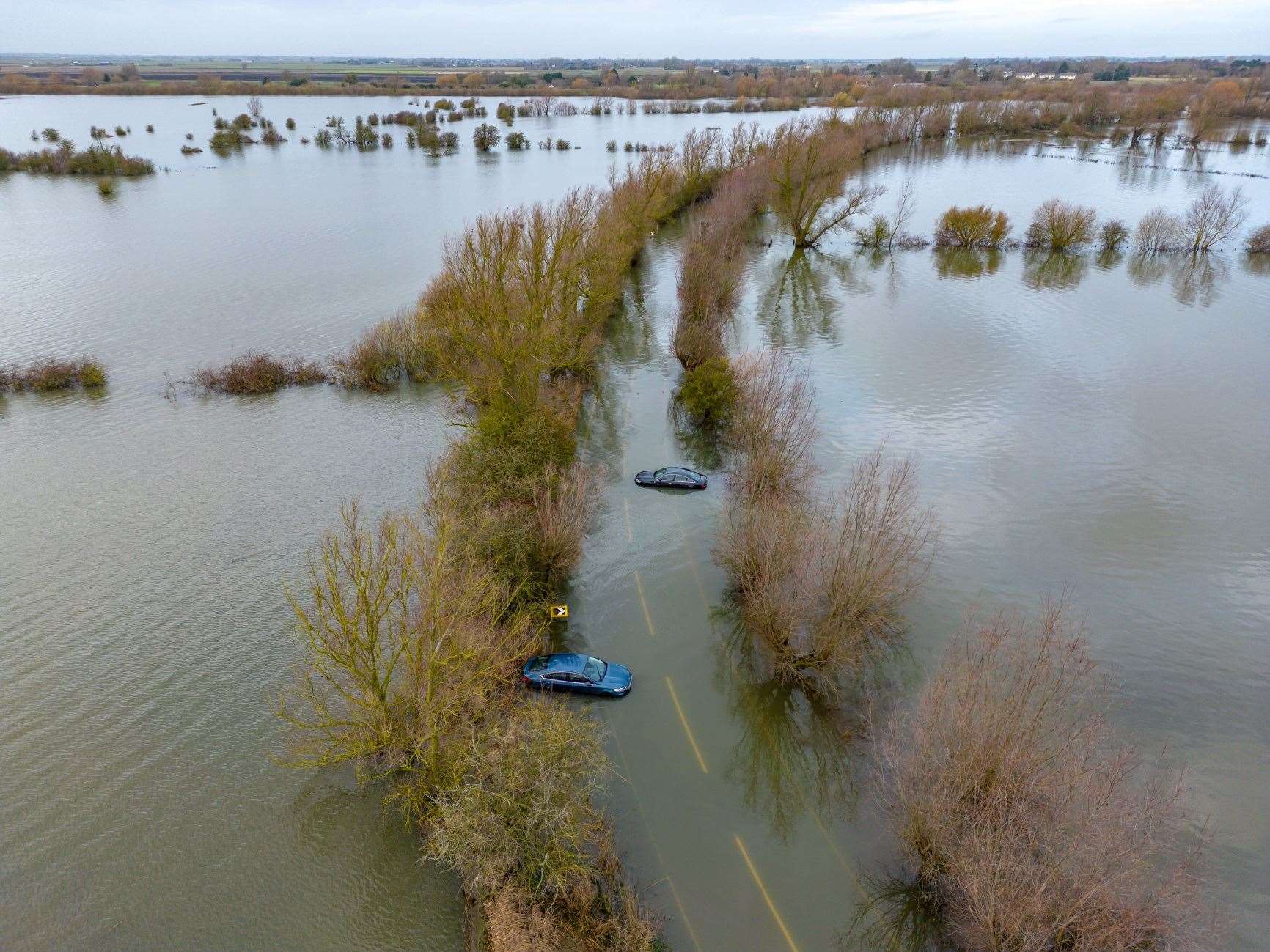 Car stuck in the flood water at Welney Causeway. Picture: Ian Burt
