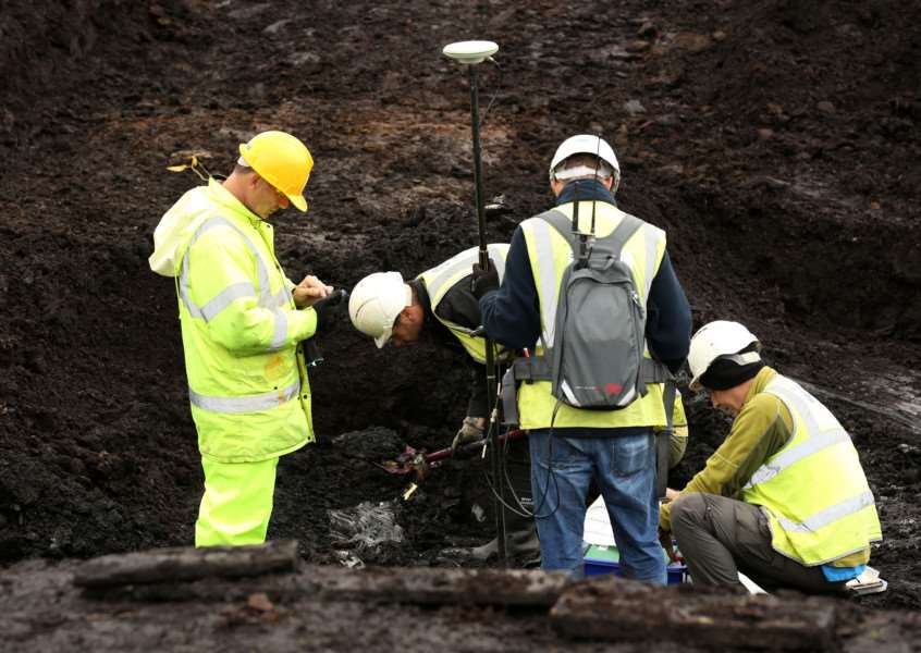 Archaeologists excavating a site near Holme Lode Farm in Cambridgeshire to recover the first artefacts from a Spitfire which has lain buried in a field for 75 years since it crashed during the Second World War. 'Photo credit: Chris Radburn/PA Wire