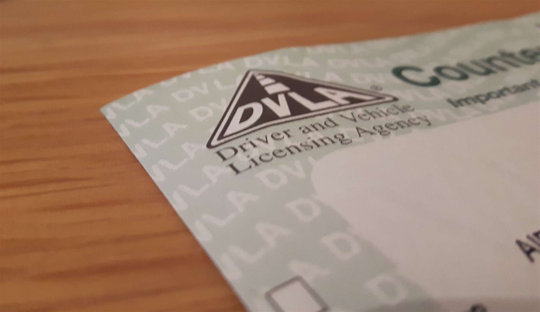 The DVLA says it is experiencing long delays to its paper applications process