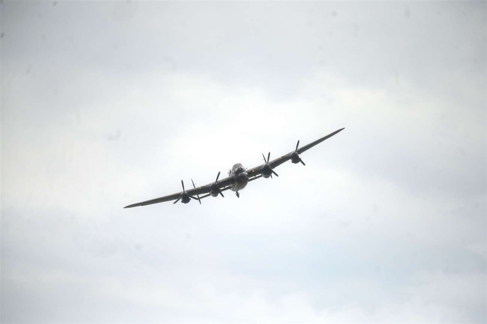 Fly past of the only flying Lancaster bomber in the UK to commerate the unveling of a plaque to those who died in a Lancseter plane at Sealeys Lane Parson Drove