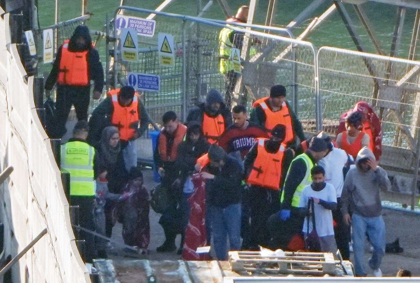 A group of people thought to be migrants have been brought in to Dover, Kent, from a Border Force vessel following a small boat incident in the Channel (Gareth Fuller/PA)