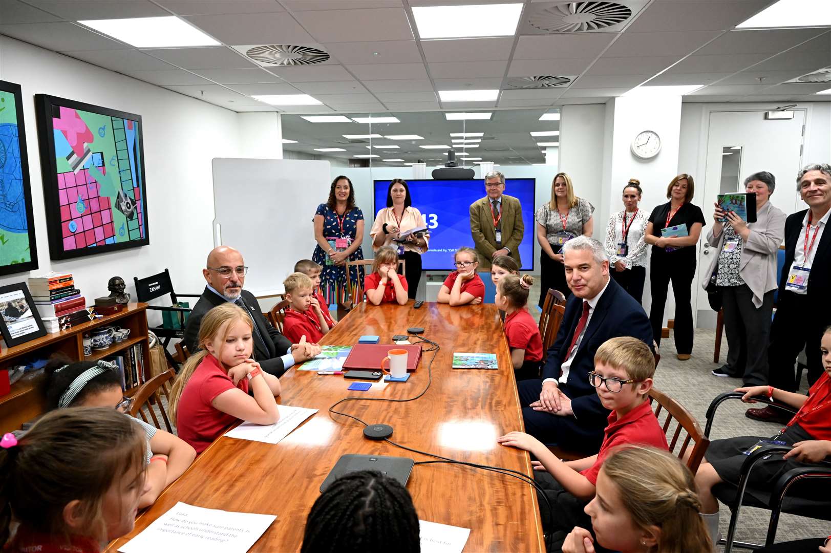 Orchards School visit to Department of Education to show the Secretary of State for Education Nadhim Zahawi a book that has been produced by the school. (57446952)