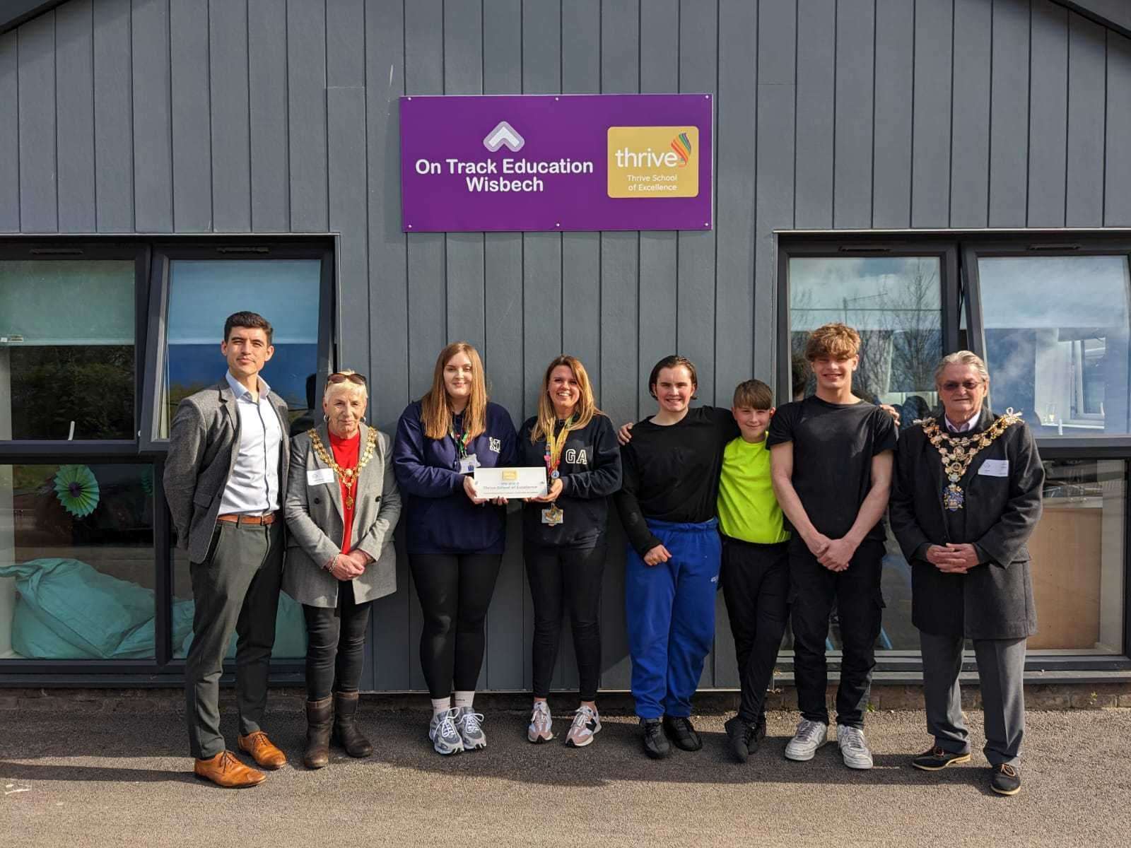 From left, Lewis Griffiths of Thrive, Mayoress of Wisbech Mrs Janet Tanfield, Natasha Moore and Gemma Adams of On Track Wisbech, pupils Theo Hayworth, Toni Lee Croft and Dylan Rowberry, and Mayor of Wisbech, Cllr Peter Human.