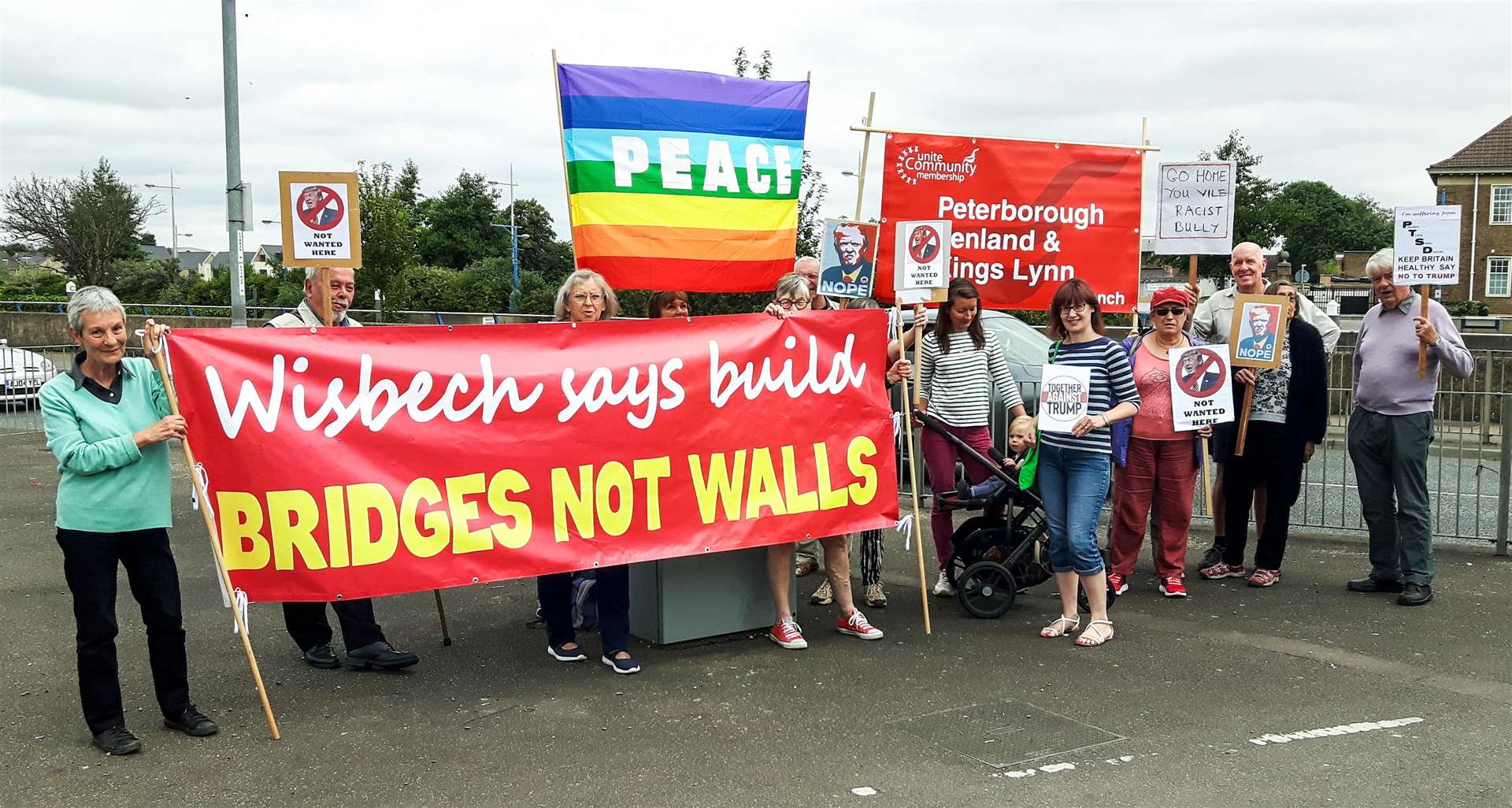 Protestors gathered at the Clarkson Memorial in Wisbech to air their views on visiting American President Donald Trump. (3076285)