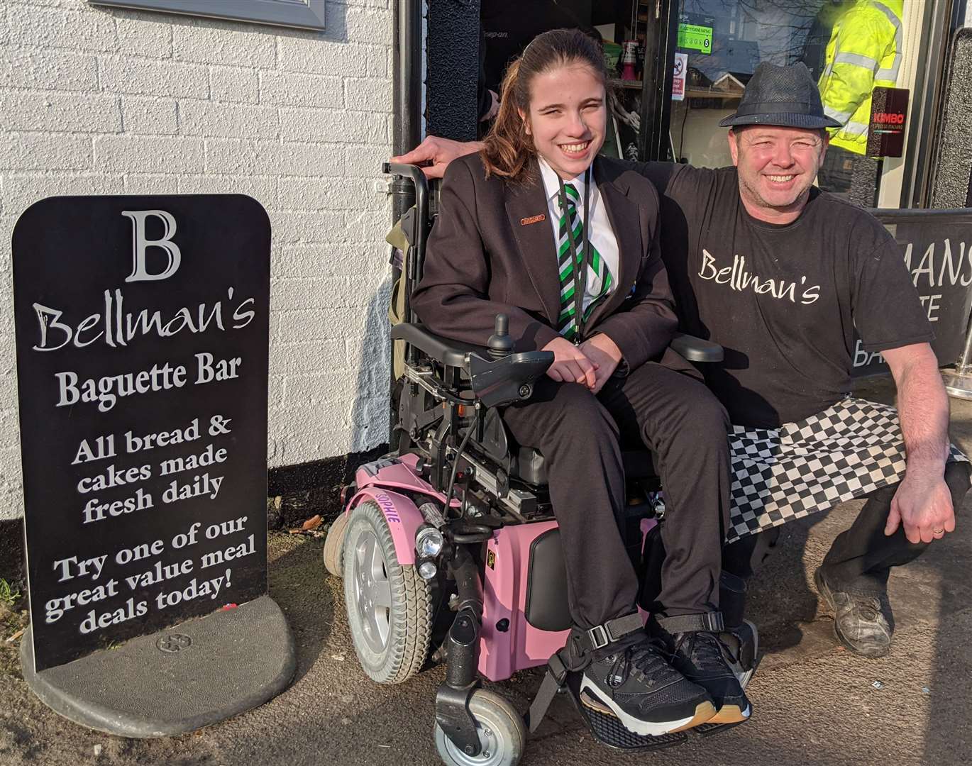 Adam Beebe presents Sophie Clarke with a donation for a new sporting wheelchair. (29012950)