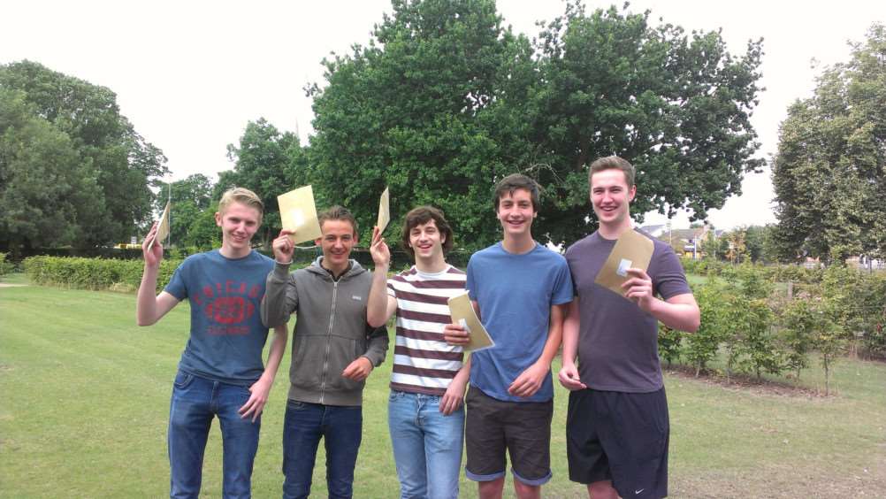 Picking up their A Level results from March's Neale Wade Academy are, from left, Kristian Potter, Jordan Tombling, James Evans, Tom Ward and Ben Morling.