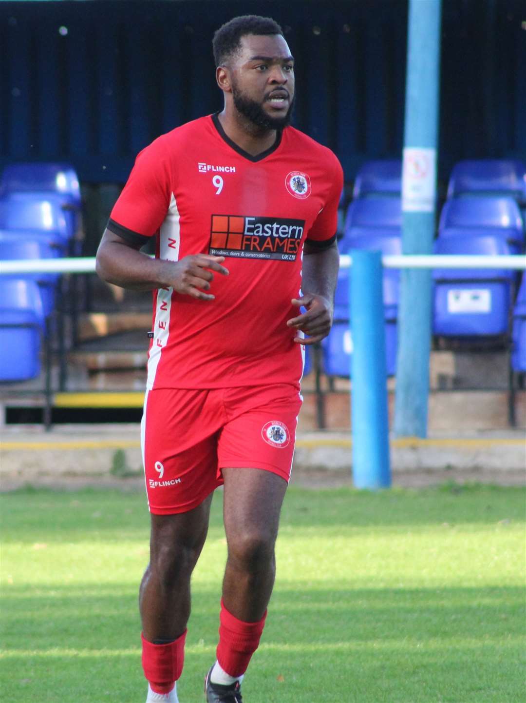 Striker Chris Assombalonga in action against Boston Town. Photo ERIN LARHAM