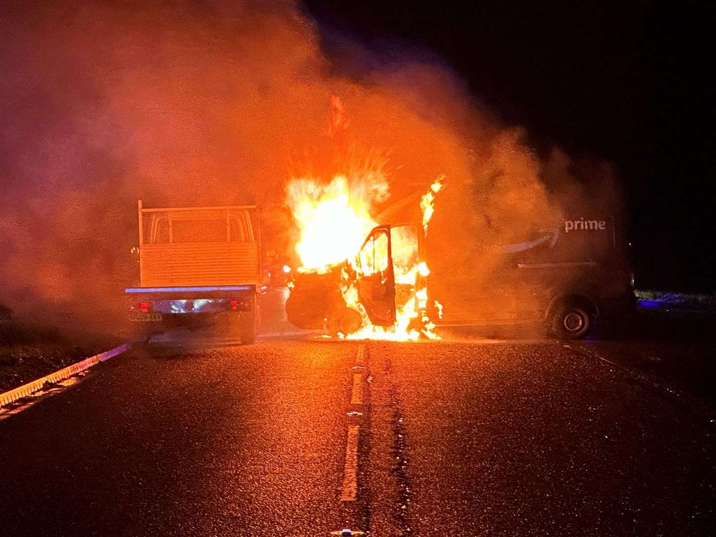 The delivery van caught fire after colliding with a bus carrying school children - fortunately no one was seriously hurt.