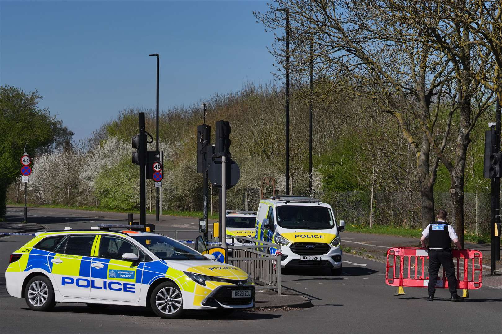 A police cordon close to the scene of the accident on Belfont Road (Jonathan Brady/PA)