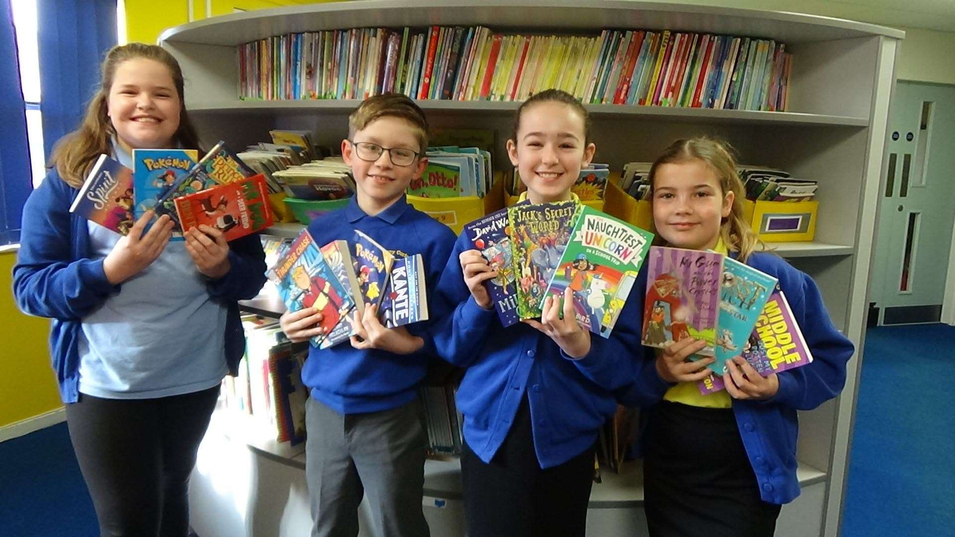 From left to right: Lauren Hurn, Finlay McMullen, Emily Swinburn and Lacey Duncan. Finlay's dad works for Book Life in King's Lynn where the books were purchased from. (62877131)