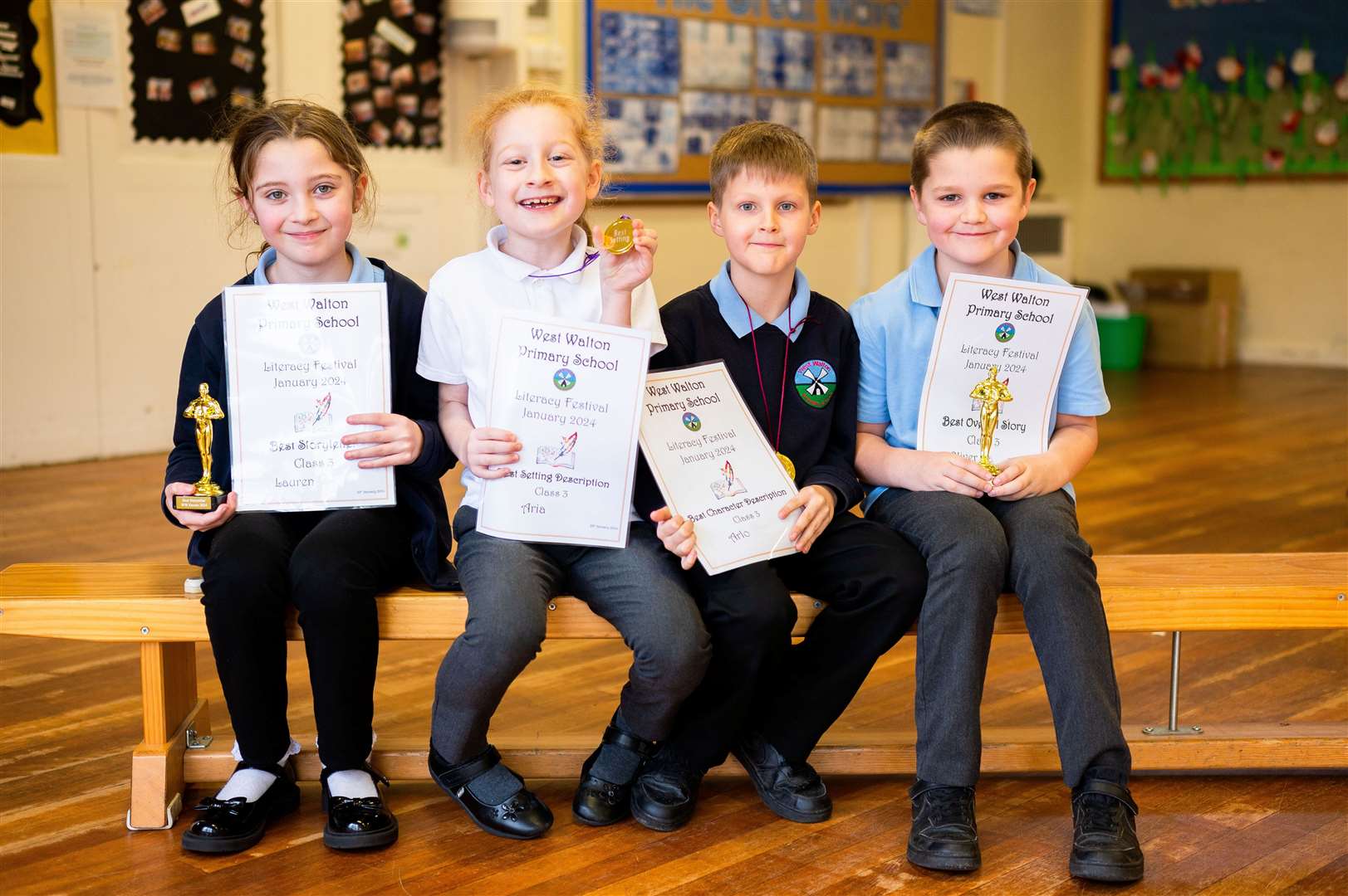 Class Three winners with their certificates and trophies.