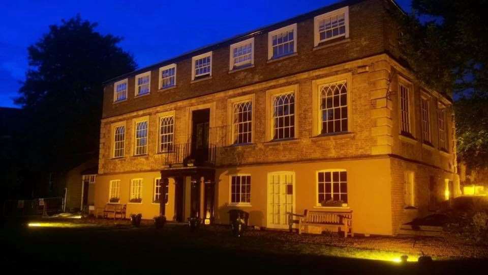 Businesses and buildings around Wisbech including the Castle went orange on Wednesday to mark National Battens Disease Day.