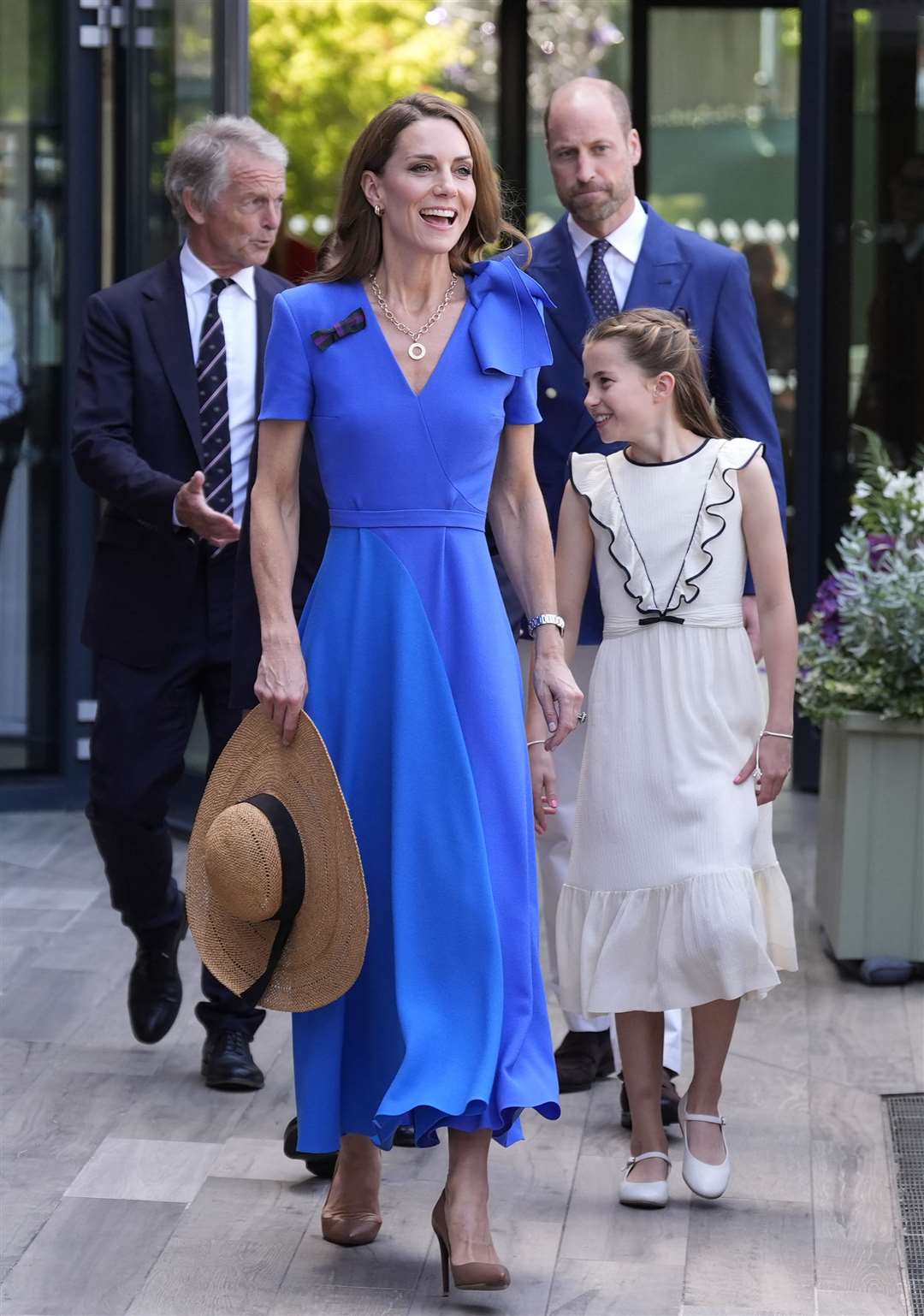 The Prince and Princess of Wales arrive with Princess Charlotte on day fourteen of the 2025 Wimbledon Championships at the All England Lawn Tennis and Croquet Club (Andrew Matthews/PA)
