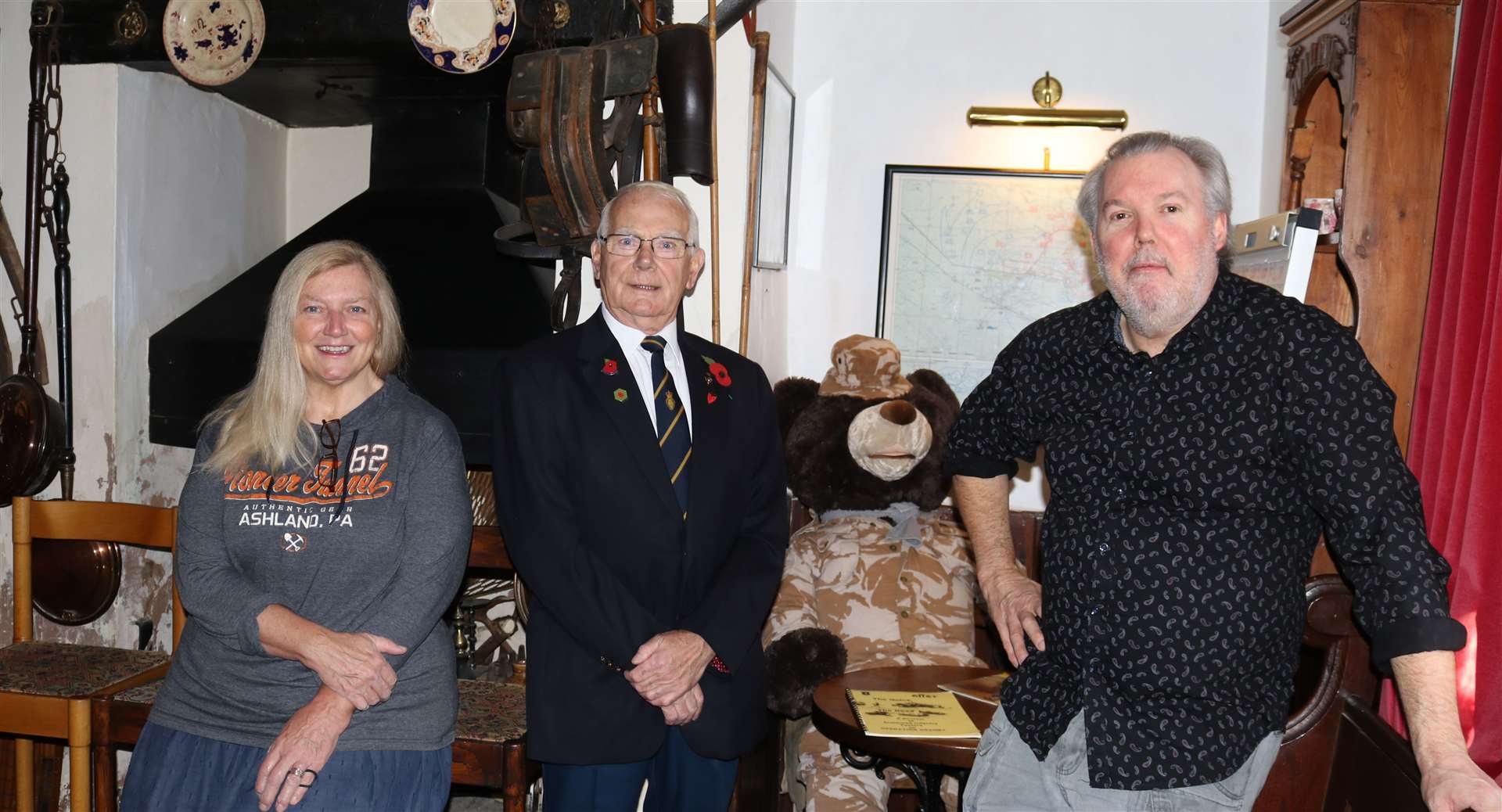 Norman Larke second from left picked the winning name, he is pictured with landlords Rebecca and David Leaning and 'George' the bear. (21629873)