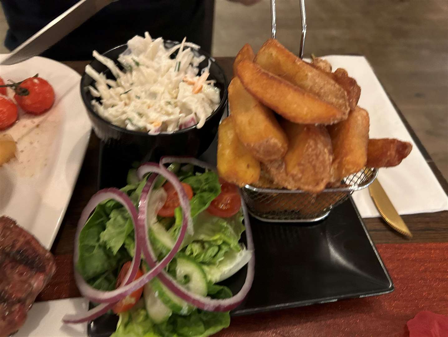 Brandon had chips, coleslaw and salad with his steak