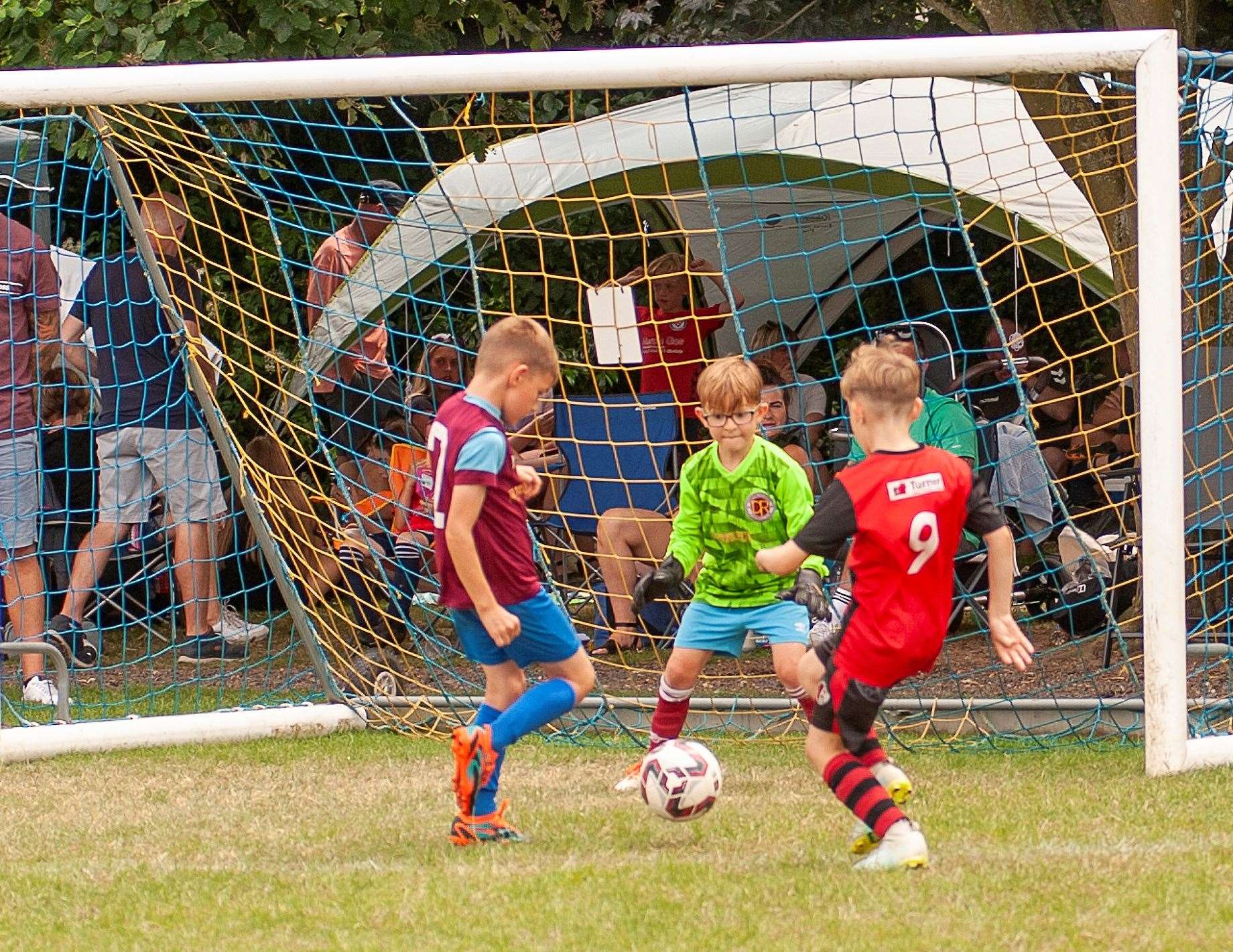 Action from the annual Wisbech St Mary football tournament.