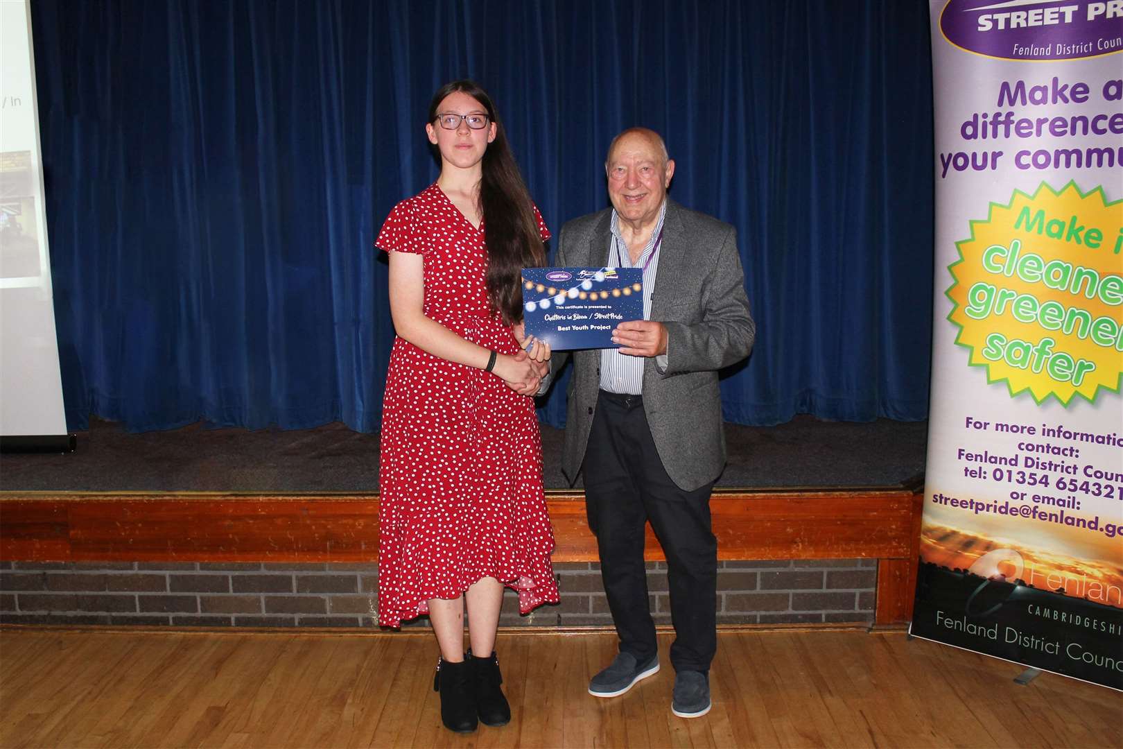 14-year-old Grace collects award for Best Youth Project on behalf of Chatteris In Bloom-Street Pride