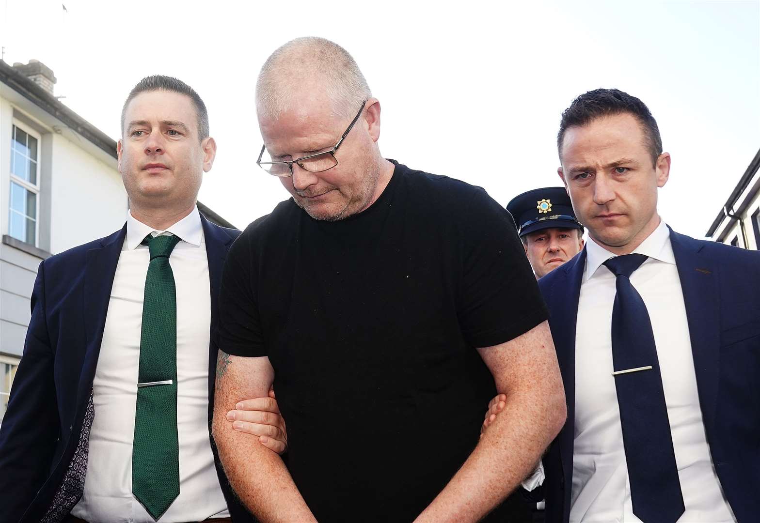 Richard Satchwell (centre) arriving at the District Court in Cashel, Co Tipperary (Brian Lawless/PA)