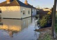 A resident had submitted images of flooding around their bungalow to illustrate the issue as part of their objection to the plans.