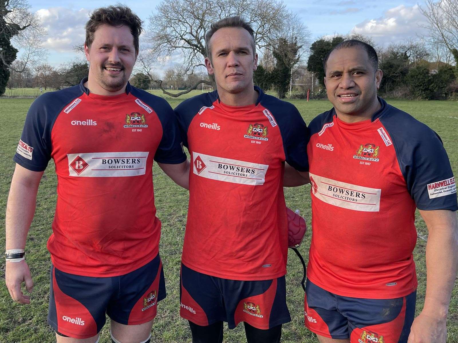 Wisbech Round Table man of the match Gerhard Wessel flanked by the two try scorers, Sam Anderson (2) and Kianoco Waisake