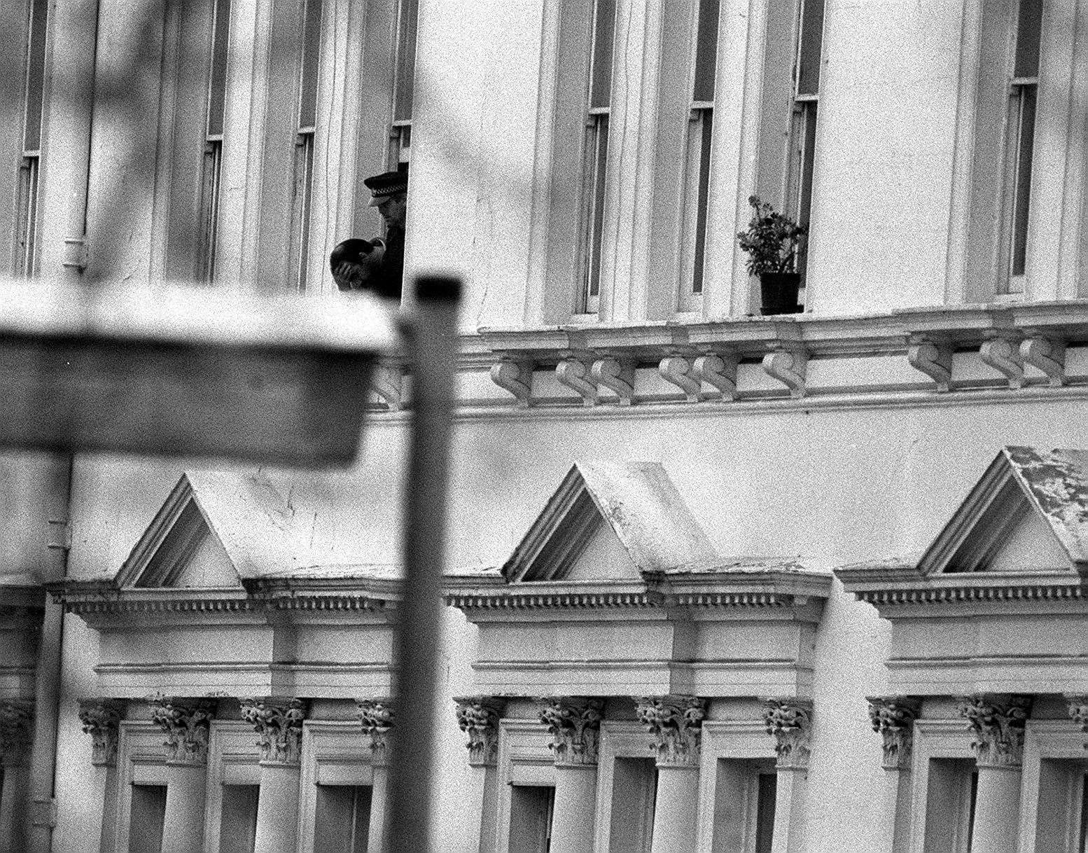 Pc Trevor Lock, speaking to police negotiators from a window at the embassy (PA)