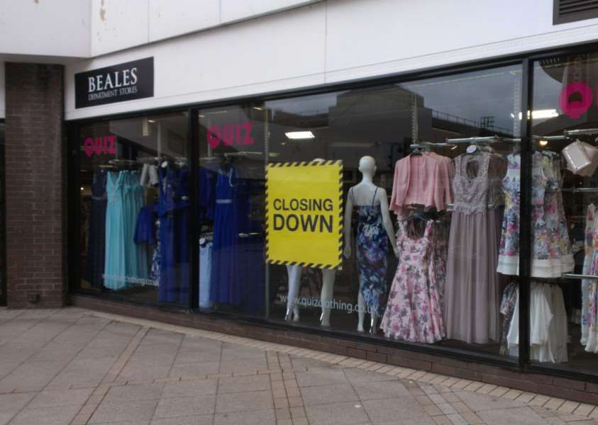 Closing down signs at Lynn's Beales store