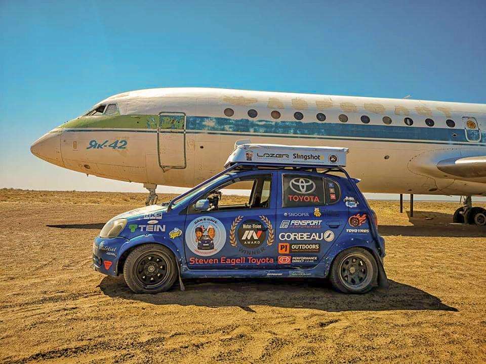 Dan and Dave spotted a plane in the middle of the Kakakstan desert. (4583433)