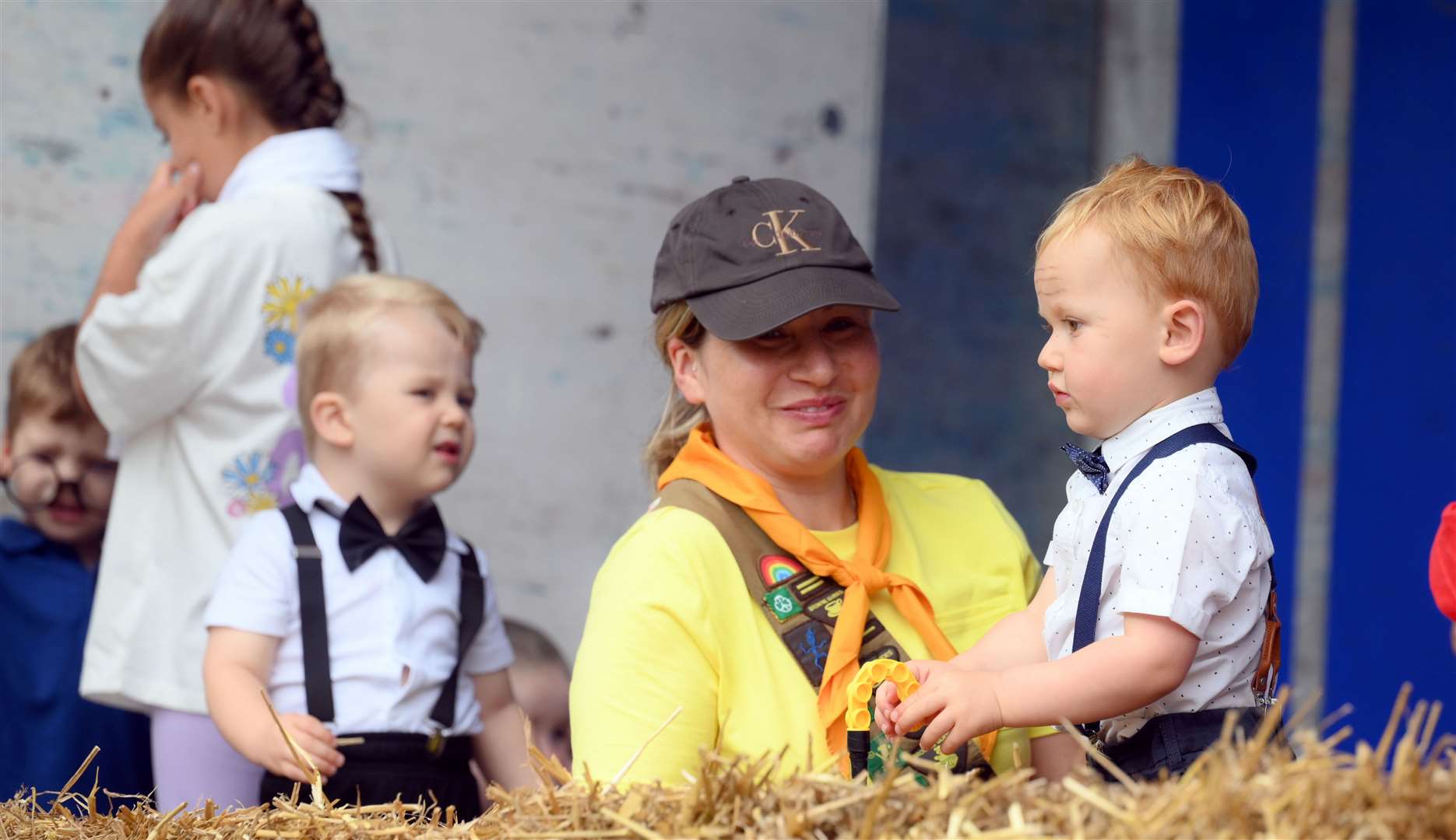 Toddlers dressed up to match the other children