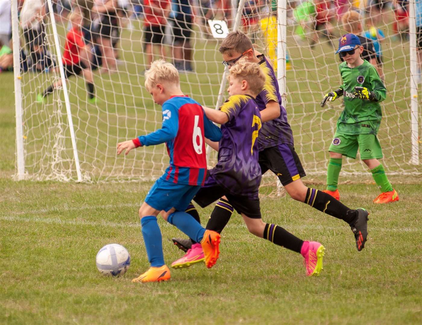 Action from the annual Wisbech St Mary football tournament.