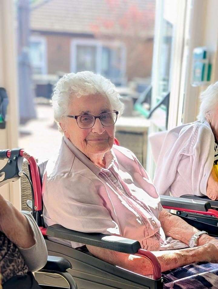 Resident Betty listening to Andrew