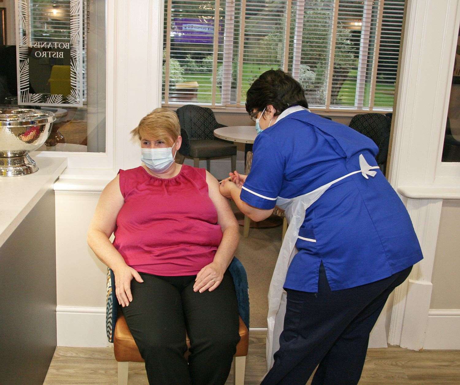 Sixty staff and residents at Lyncroft Care Home have had the Covid-19 vaccination. Nurse Practitioner Helen Cook from The Clarkson Surgery administers the jab to home manager Brenda Durrington.