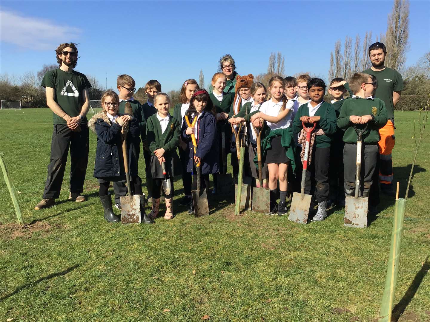 Ashley Lydiate from Groundwork helped children in Years 6 , 4 and 3 plant trees at All Saints Academy.