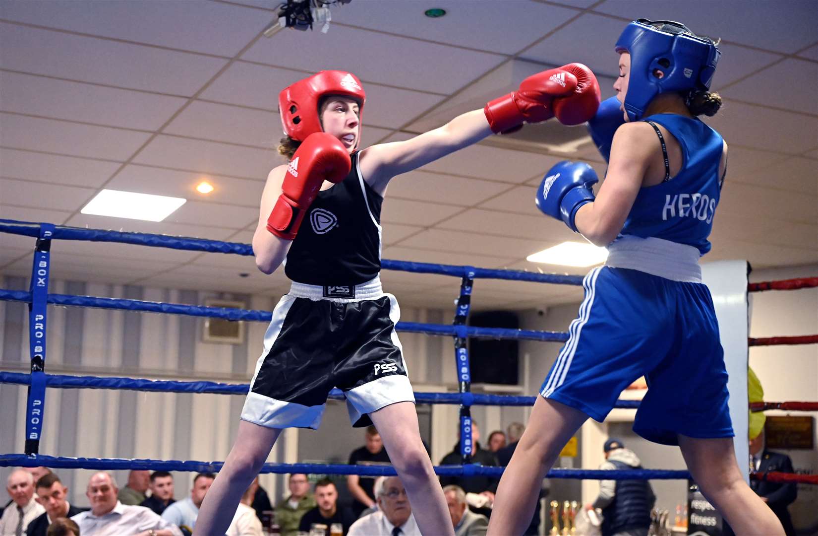 March Boxing Club evening of boxing..Lacie Moulding (red) v Imogen Cave (blue). (55848570)