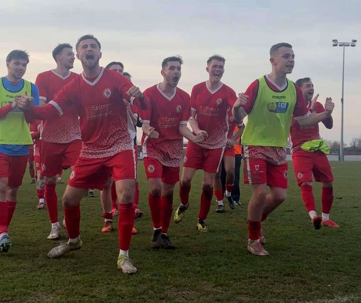 Wisbech players celebrate in front of their fans. Picture: Erin Larham
