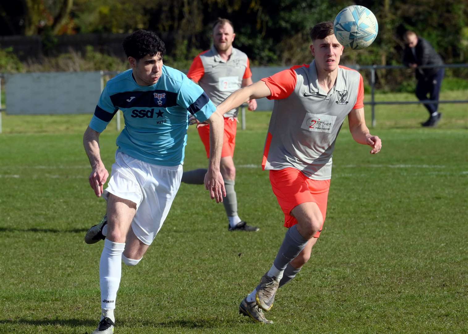 Parson Drove (grey and orange) v Holland (blue). Luke Crombie