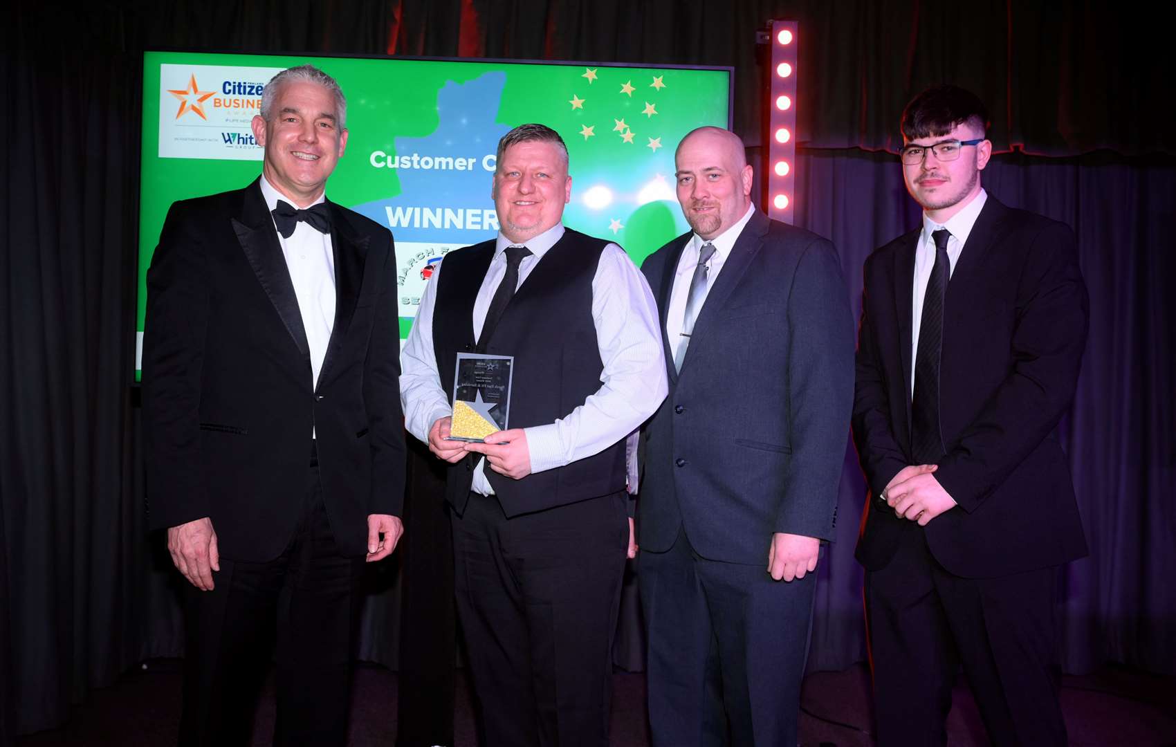 Fenland Citizen Business Awards 2025 Customer Care winners March Fast Fit & Servicing who received their award from local MP Steve Barclay