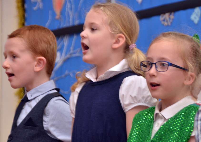 Children practice for the nativity play's chorus. Photo by Tim Wilson. SG151216-104TW. ANL-161217-190431001