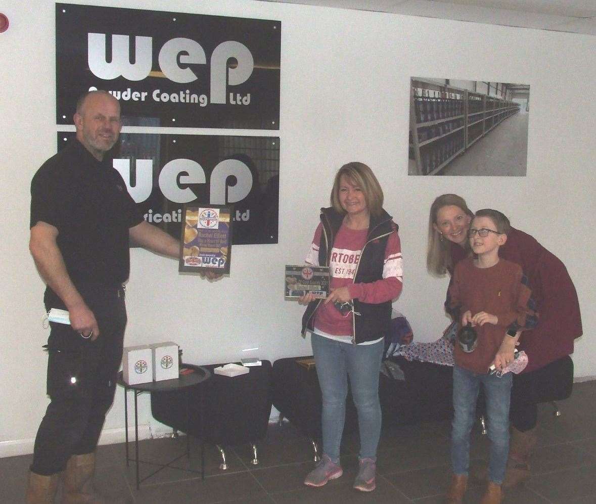 The sponsor WEP Fabrications is Wayne Pentelow and he is the one pictured handing over the award to Rachel Elliott watched by Finley and his mum Sarah Dodkin. (45391277)
