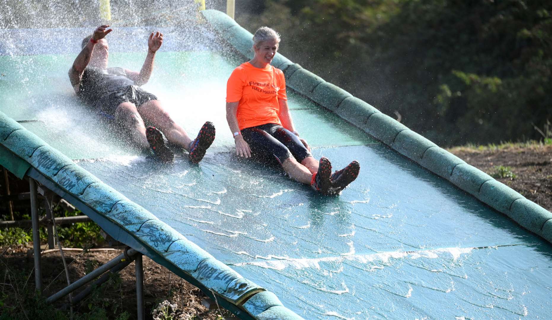 Sliding down one obstacle at Washbrook Farm