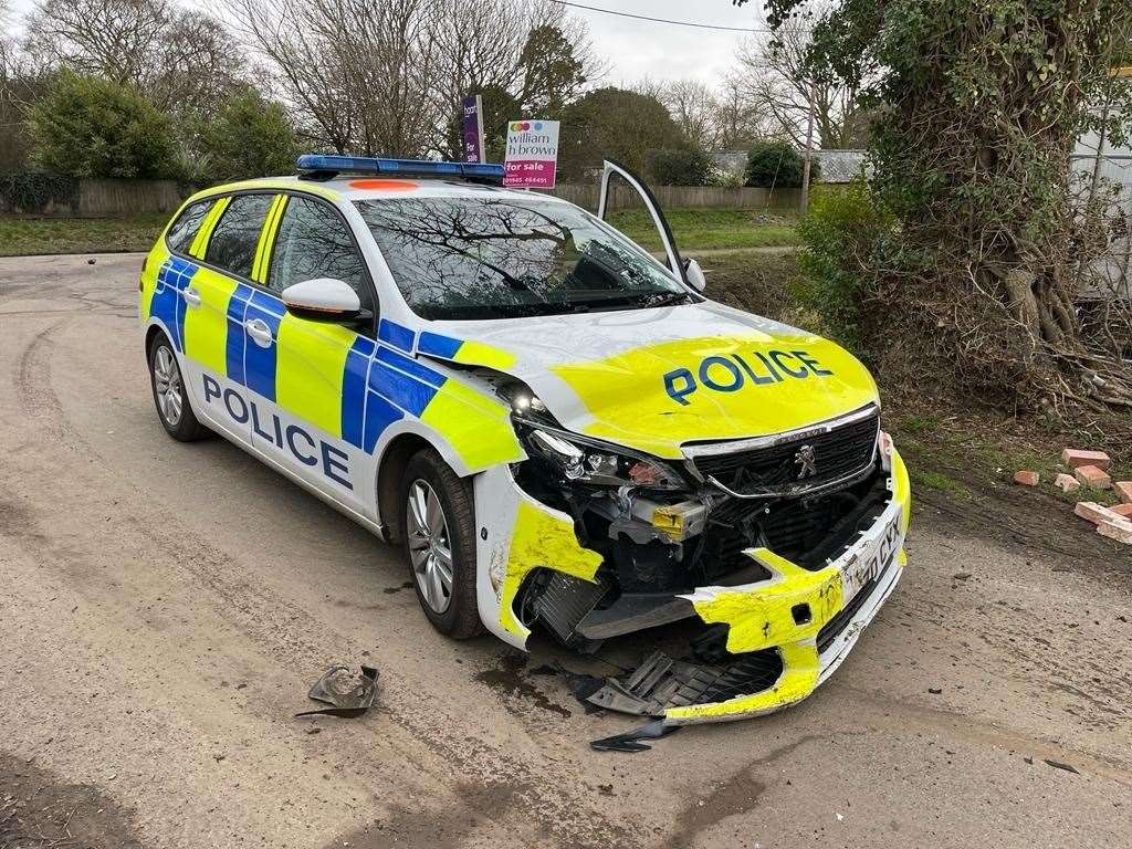 Three men charged after police officers injured