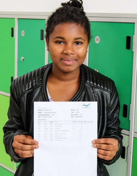 Rosa Djola with her results.