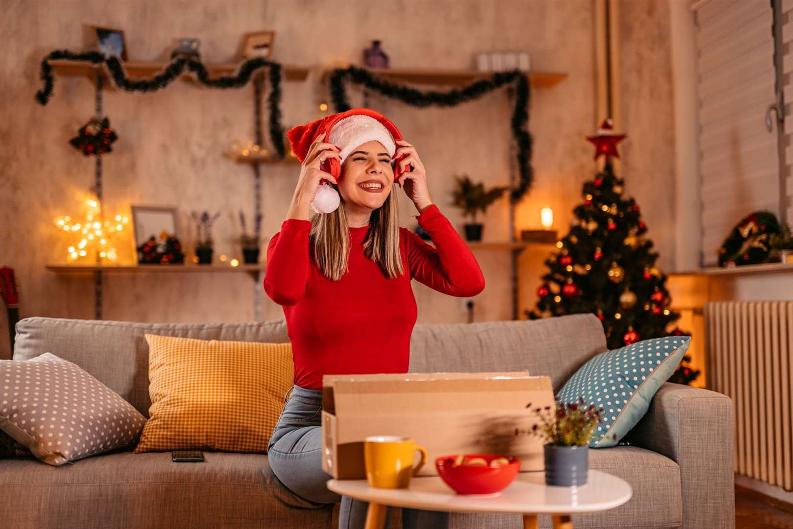She's humming along to Christmas music