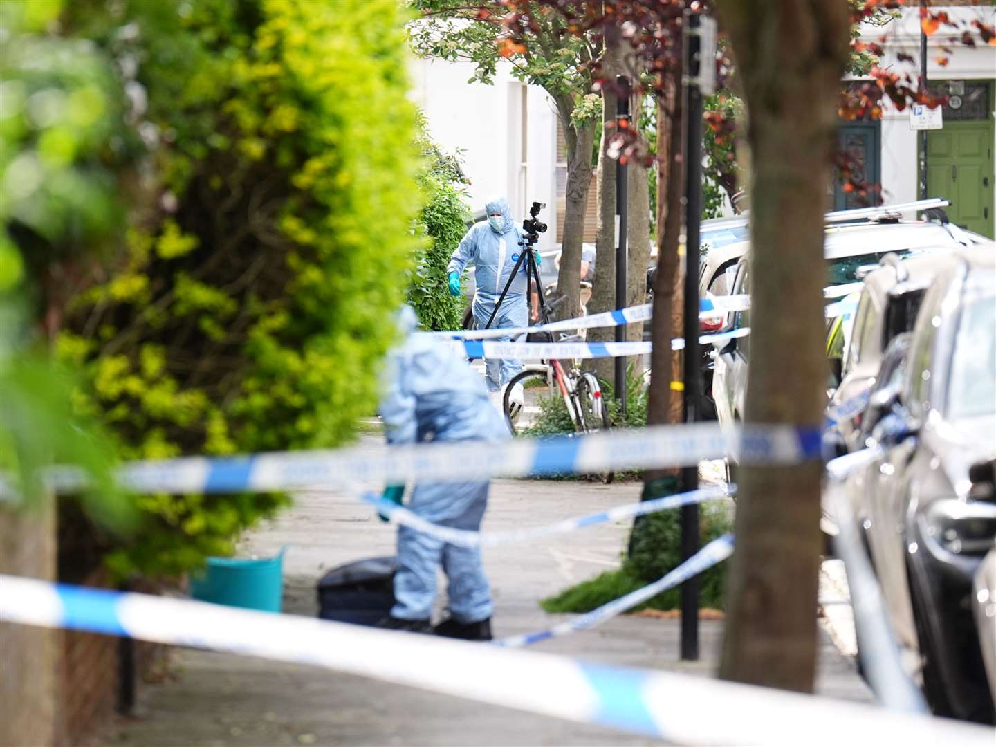 A forensics officer at the scene of the incident in Kentish Town (James Manning/PA)